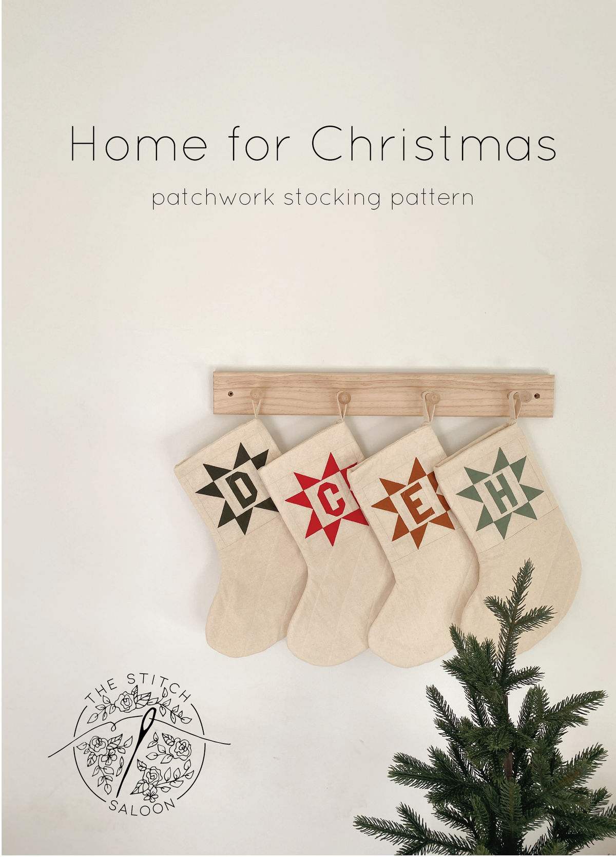 Sewing pattern cover by the stitch saloon, four rustic Christmas stockings hanging with Christmas tree