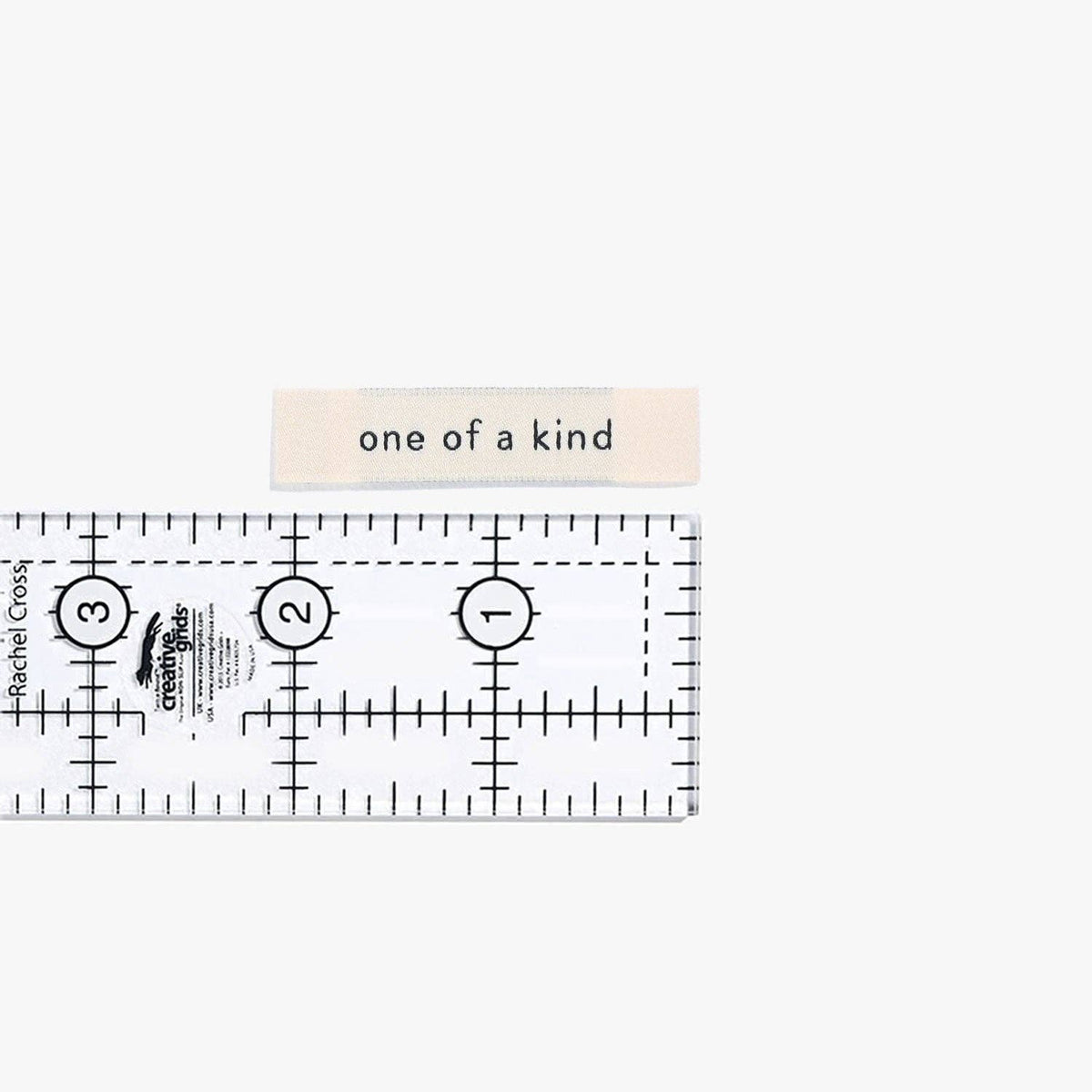 One Of A Kind Woven Labels - Kylie and the Machine
