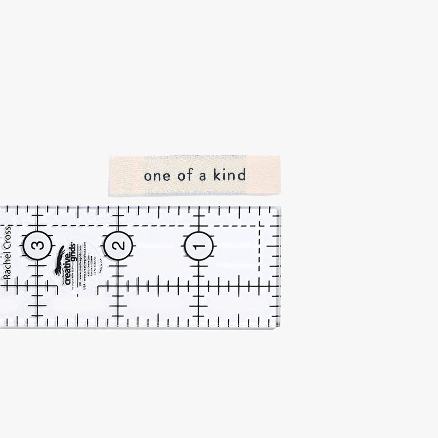 One Of A Kind Woven Labels - Kylie and the Machine
